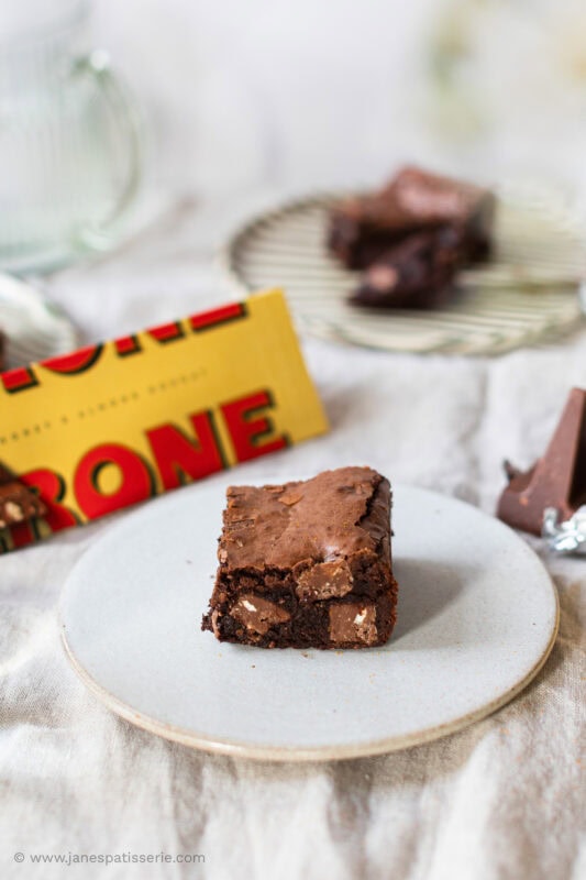 Toblerone packaging with a toblerone brownie on a plate