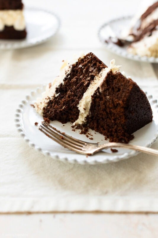 A slice of baileys cake with a fork on a plate