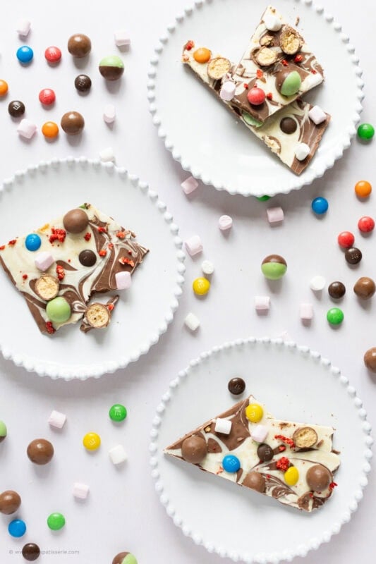 Multiple plates of chocolate bark