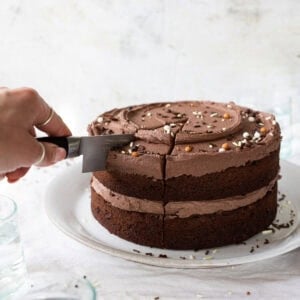 A knife cutting into back to basics chocolate cake
