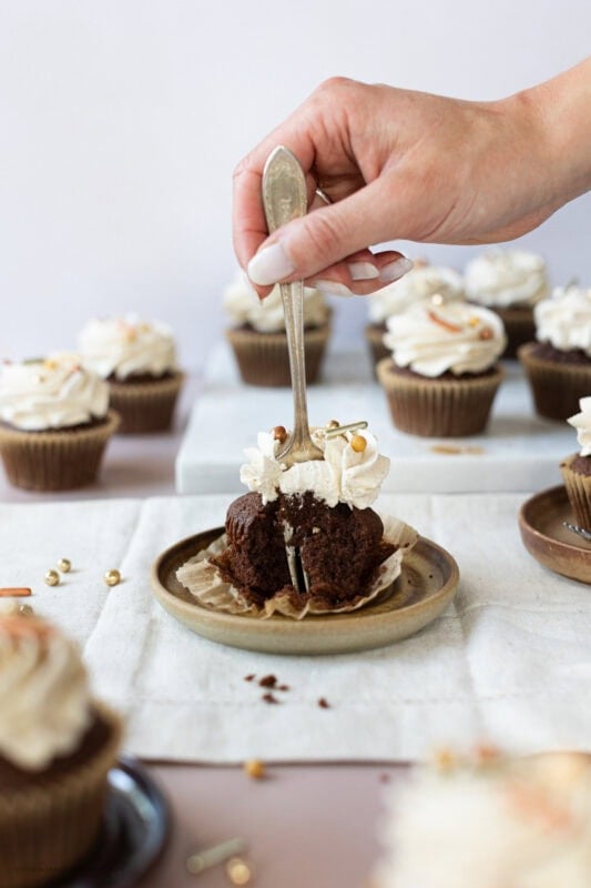 A fork in a chocolate chai cupcake