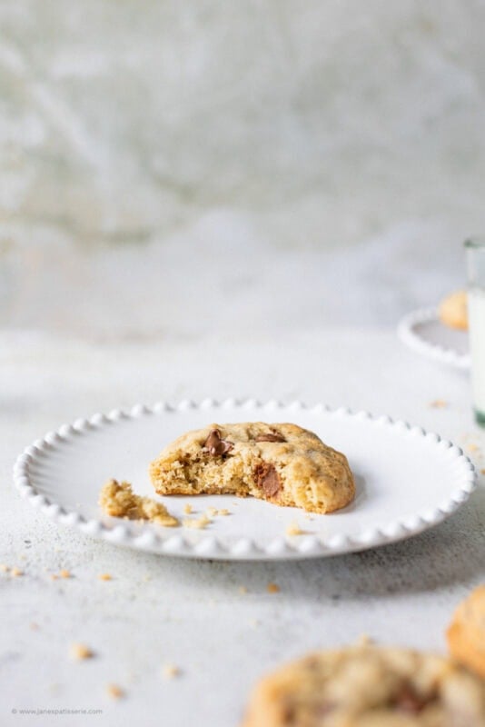 Half a chocolate oat cookie on a plate