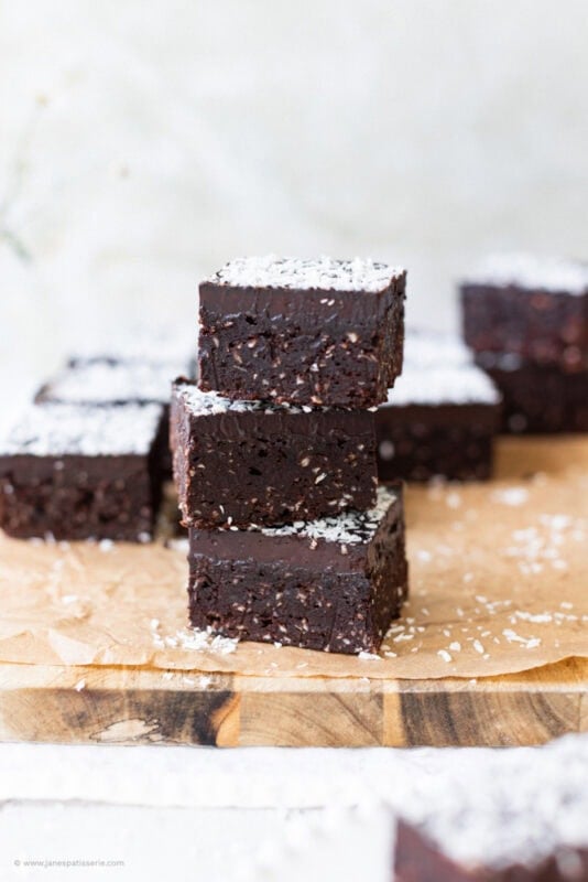 A stack of three coconut brownies