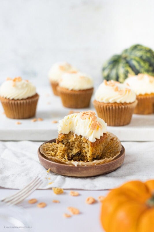 A bite taken from a Pumpkin Cupcake