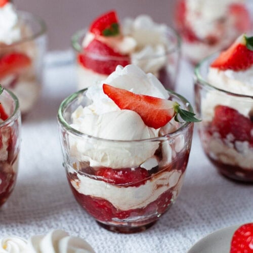 A close up of a single Eton Mess and homemade meringues.