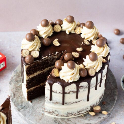 A slice taken from a Malteser Drip Cake