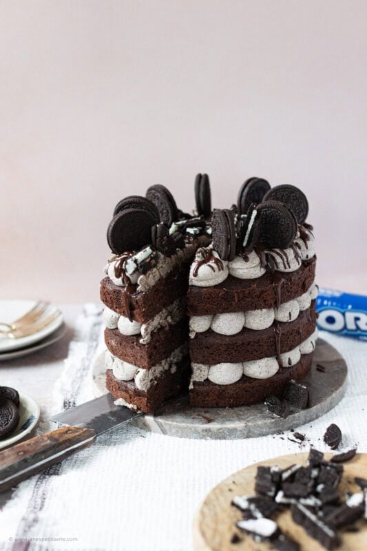 A slice coming out of the Oreo Cake