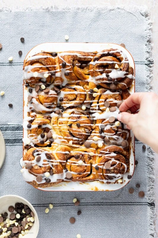 A whole tray of sticky chocolate sweet rolls