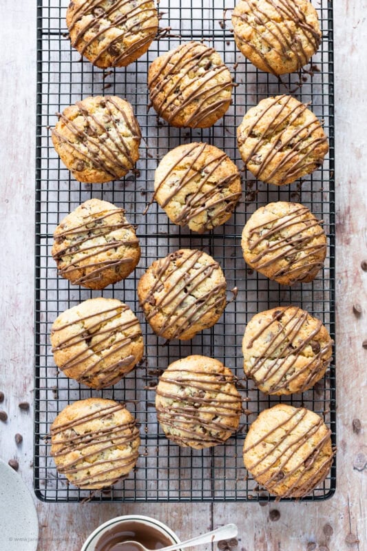 A top down shot of a coconut chocolate rocks on a cooling rack