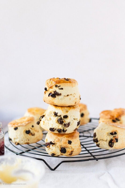 A stack of three Fruit Scones on a cooling rack