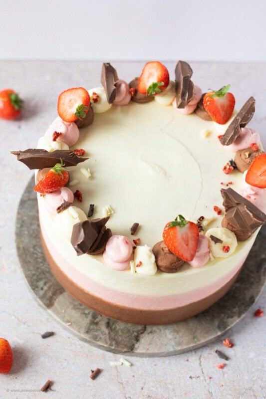 A top down shot of a whole Neapolitan cake