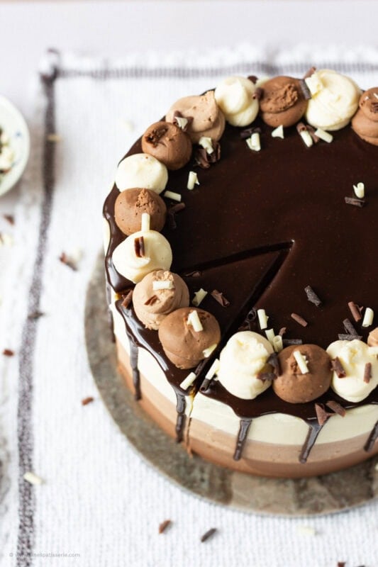 A top down shot of a whole Triple Chocolate Cake