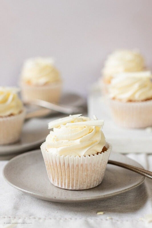 A plate with a single White Chocolate Cupcake
