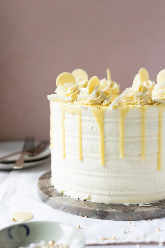 A side profile of the White Chocolate Drip Cake