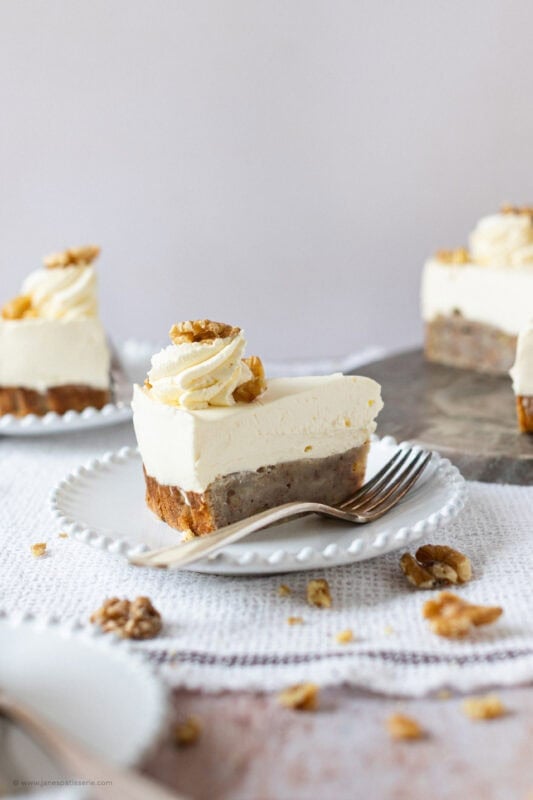 A slice of Banana Bread Cheesecake on a plate