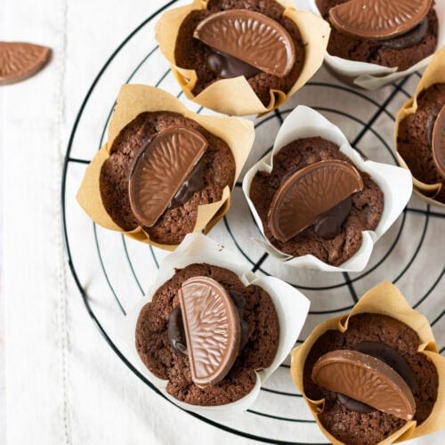 A cooling rack of Chocolate Orange Muffins