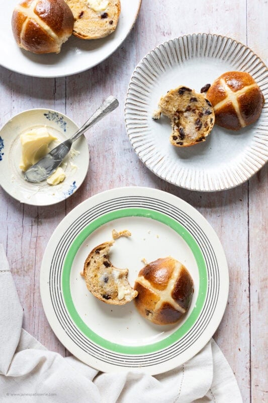 Plates of hot cross buns