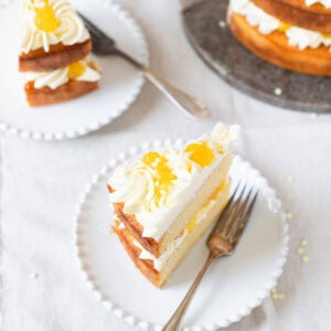 A slice of Lemon Celebration Cake on a plate