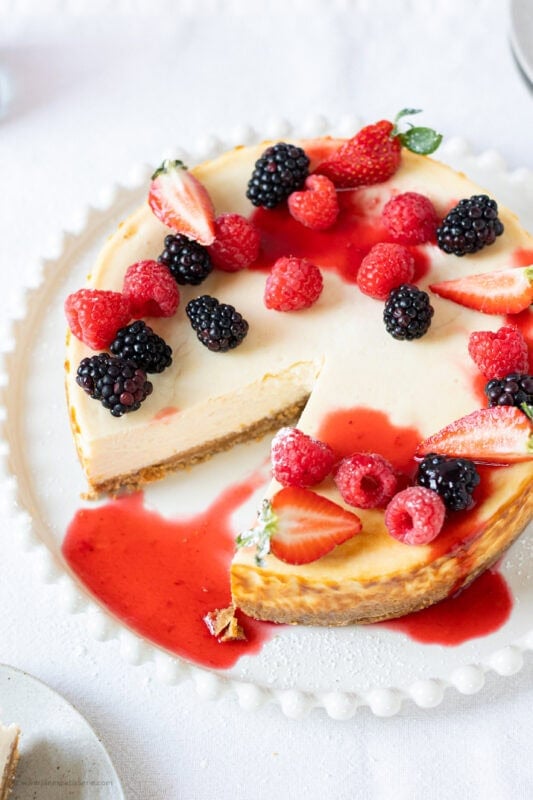 A slice taken from a full New York Cheesecake