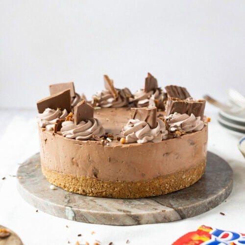A served No-bake Daim Cheesecake on a chopping board